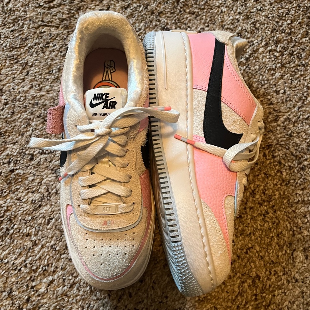 Nike Pink and Cream Sneakers with Classic Design